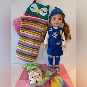 AG Wellie Wishers Willa in Daisy Scout uniform, sleeping bag, and 2 outfits.